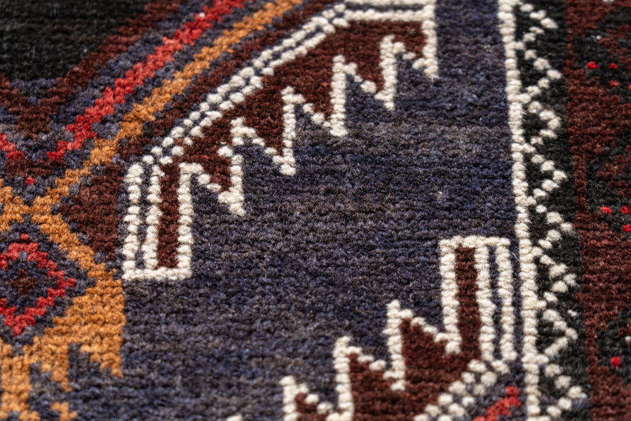 ヴィンテージラグ　トライバルラグ　バルーチラグ　手織りラグ　絨毯　イーブルアイ　幾何学模様　バルーチ族　1980年代