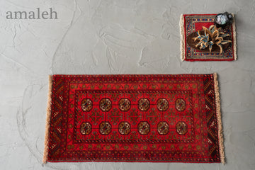 アフガニスタン産　1980年代　トライバルラグ　トルクメン族　トルクメンラグ　赤い絨毯　ギュル　アニマルヘッド　羊の角　縁起物　リビングサイズ　6畳　8畳　10畳　12畳　ダイニングテーブル　ソファ　テーブル　寝室　スタジオ　和室　ディスプレイ　家具　ヴィンテージ家具　手織り　絨毯　カーペット　amaleh　通販